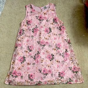 A mini dress in gorgeous light pink and lace all around for social gathering ,